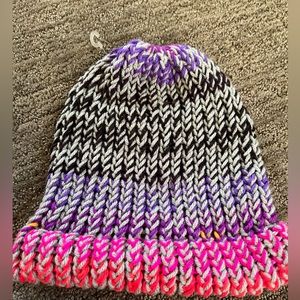 Lovely multicolor beanie knit yarn hat.